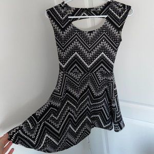 Black and white short dress with an open back